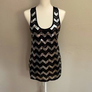 Black sleeveless shirt with black and silver chevron sequence